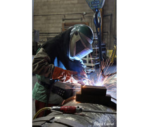 Photo of Welder by David Carriel - Printed by Diversified Lab